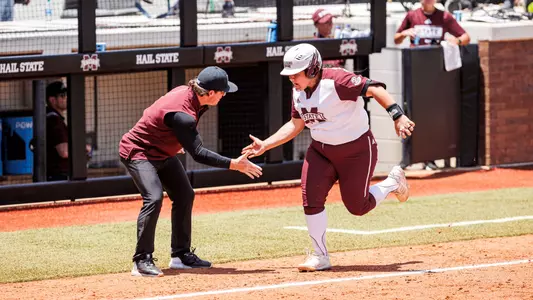 STARKVILLE, MS - May 27, 2022 - Mississippi State Catcher/Infielder Mia Davidson (#33) hits a home run during the NCAA Super Regionals game between the Arizona Wildcats and the Mississippi State Bulldogs at Nusz Park in Starkville, MS. Photo By Kevin Snyder