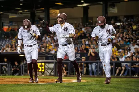 PEARL, MS - February 28, 2023 - Mississippi State Catcher Ross Highfill (#22), Mississippi State Infielder Amani Larry (#8), and Mississippi State Infielder Lane Forsythe (#43) during the game between the Southern Miss Golden Eagles and the Mississippi State Bulldogs at Trustmark Park in Pearl, MS. Photo By Jaden Powell
