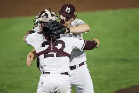STARKVILLE, MS - March 11, 2023 - Mississippi State Pitcher KC Hunt (#2) and Mississippi State Catcher Ross Highfill (#22) after the game between the Lipscomb Bison and the Mississippi State Bulldogs at Dudy Noble Field at Polk-Dement Stadium in Starkville, MS. Photo By Kevin Snyder
