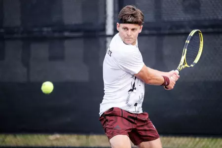 STARKVILLE, MS - March 11, 2023 - Mississippi State's Ewen Lumsden during the match between the Belmont Bruins and the Mississippi State Bulldogs at the AJ Pitts Tennis Centre in Starkville, MS. Photo By Will Porada