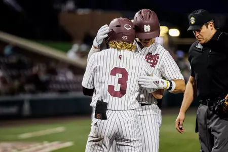 STARKVILLE, MS - March 21, 2023 - Mississippi State Infielder David Mershon (#3) and Mississippi State Colton Ledbetter (#10) during the game between the Arkansas State Red Wolves and the Mississippi State Bulldogs at Dudy Noble Field at Polk-Dement Stadium in Starkville, MS. Photo By Will Porada