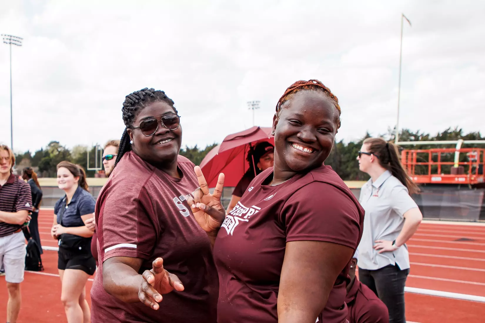 STARKVILLE, MS - March 24, 2023 - Mississippi State Associate Track and Field Coach April Thomas and Mississippi State Thrower Tafada Wright during the Bulldog Relays at the Mike Sanders Track Complex in Starkville, MS. Photo By Mike Mattina