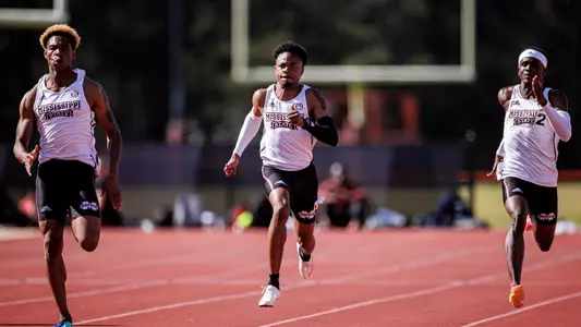 STARKVILLE, MS - March 25, 2023 - Mississippi State Sprinter Cameron Crump, Mississippi State Sprinter Lee Eppie, and Mississippi State Sprinter Shamar Rose during the Bulldog Relays at the Mike Sanders Track Complex in Starkville, MS. Photo By Will Porada