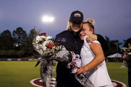 STARKVILLE, MS - October 27, 2022 - Mississippi State Midfielder Alyssa D'Aloise (#10) and Mississippi State Volunteer Assistant Coach Kat Stratton during the match between the Georgia Bulldogs and the Mississippi State Bulldogs at the MSU Soccer Field in Starkville, MS. Photo By Mike Mattina