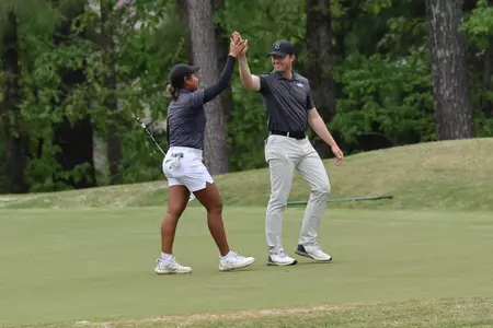 BIRMINGHAM, AL - April 15, 2023 - Mississippi State's Surapa Janthamunee and Mississippi State Head Coach Charlie Ewing during the SEC Women's Golf Championship Greystone Golf & Country Club in Birmingham, AL. Photo By Jimmie Miitchell