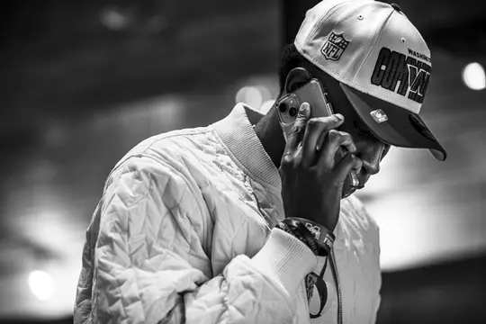 VAIDEN, MS - April 27, 2023 - Former Mississippi State Cornerback Emmanuel Forbes Jr. (#13) takes a phone call after being drafted 16th overall by the Washington Commanders during the 2023 2023 NFL Draft at Deep South Game Ranch in Vaiden, MS. Photo By Kevin Snyder