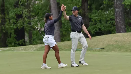 BIRMINGHAM, AL - April 15, 2023 - Mississippi State's Surapa Janthamunee and Mississippi State Head Coach Charlie Ewing during the SEC Women's Golf Championship Greystone Golf & Country Club in Birmingham, AL. Photo By Jimmie Miitchell