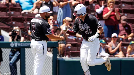 STARKVILLE, MS - May 07, 2023 - Mississippi State Infielder/Outfielder Hunter Hines (#44) and Baseball Camps Coordinator/Volunteer Assistant Kyle Cheesebrough during the game between the Arkansas Razorbacks and the Mississippi State Bulldogs at Dudy Noble Field at Polk-Dement Stadium in Starkville, MS. Photo By Laura Parsley