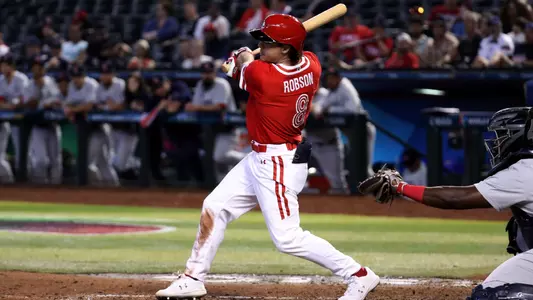 Mar 12, 2023; Phoenix, Arizona, USA; Team Canada outfielder Jacob Robson (8) at the plate against Team Great Britain at Chase Field. Mandatory Credit: Zachary BonDurant-USA TODAY Sports