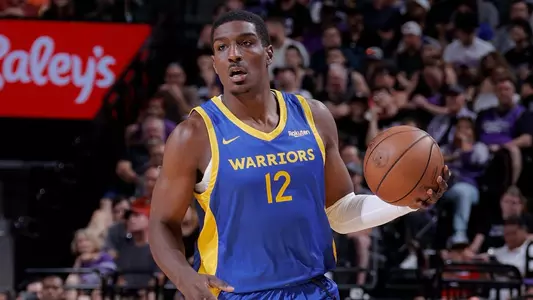 SACRAMENTO, CA - JULY 3: Reggie Perry #12 of the Golden State Warriors dribbles the ball during the game against the Sacramento Kings during the 2023 NBA California Classic on July 3, 2023 at Golden 1 Center in Sacramento, California. NOTE TO USER: User expressly acknowledges and agrees that, by downloading and or using this Photograph, user is consenting to the terms and conditions of the Getty Images License Agreement. Mandatory Copyright Notice: Copyright 2023 NBAE (Photo by Rocky Widner/NBAE via Getty Images)