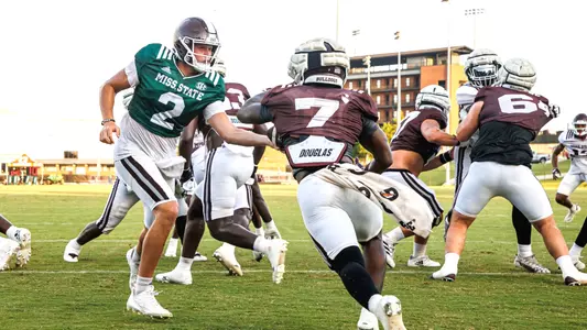 STARKVILLE, MS - August 12, 2023 - Mississippi State Quarterback Will Rogers (#2) and Mississippi State Running Back Jo'quavious Marks (#7) during a training camp practice at the Leo Seal Jr. Football Complex at Mississippi State University in Starkville, MS. Photo By Mike Mattina