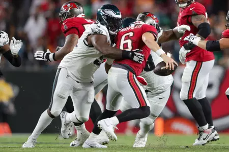 Sep 25, 2023; Tampa, Florida, USA;  Tampa Bay Buccaneers quarterback Baker Mayfield (6) is sacked by Philadelphia Eagles defensive tackle Fletcher Cox (91) in the second quarter at Raymond James Stadium. Mandatory Credit: Nathan Ray Seebeck-USA TODAY Sports