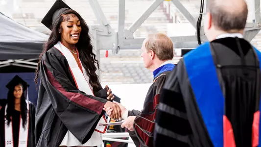 STARKVILLE, MS - May 12, 2023 - Mississippi State Forward/Center Jessika Carter (#4) during a spring commencement ceremony at Davis Wade Stadium at Scott Field in Starkville, MS. Photo By Mike Mattina