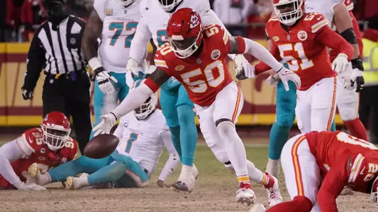 Jan 13, 2024; Kansas City, Missouri, USA; Kansas City Chiefs linebacker Willie Gay (50) moves in to recover the ball against the Miami Dolphins during the second half of the 2024 AFC wild card game at GEHA Field at Arrowhead Stadium. Mandatory Credit: Denny Medley-USA TODAY Sports