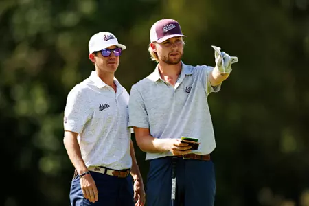 FAYETTEVILLE, AR - September 30, 2024 - Mississippi State's Garrett Endicott and Mississippi State Head Coach Dusty Smith during the Blessings Collegiate Invitational at Blessings Golf Club in Fayetteville, AR. Photo By Wesley Hitt