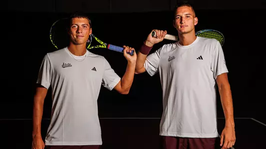 STARKVILLE, MS - August 26, 2024 - Mississippi State's Petar Jovanovic and Mississippi State's Benito Sanchez Martinez during production day at the Rula Tennis Pavilion in Starkville, MS. Photo By Hallie Walker