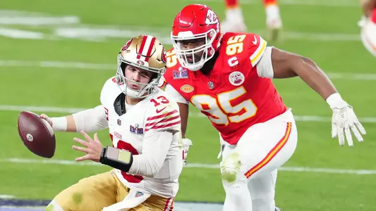Feb 11, 2024; Paradise, Nevada, USA; San Francisco 49ers quarterback Brock Purdy (13) is pressured by Kansas City Chiefs defensive tackle Chris Jones (95) in the second half in Super Bowl LVIII at Allegiant Stadium. Mandatory Credit: Stephen R. Sylvanie-USA TODAY Sports