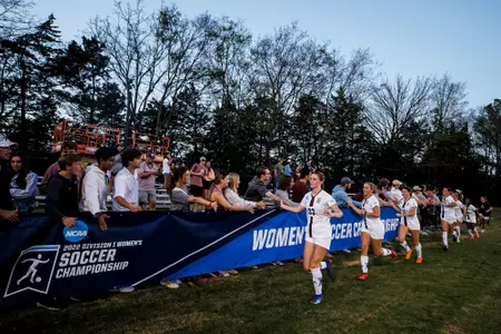 STARKVILLE, MS - November 11, 2022 - Mississippi State Midfielder Ashlyn Kane (#33), Mississippi State Forward Lucy Hurst (#27) and Mississippi State Midfielder/Forward Hannah Johnson (#11) react with fans during the First Round NCAA match between the New Mexico State Aggies and the Mississippi State Bulldogs at the MSU Soccer Field in Starkville, MS. Photo By Mike Mattina