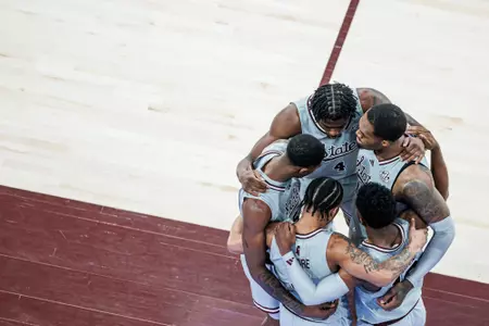 STARKVILLE, MS - February 21, 2024 - Mississippi State Guard/Forward Cameron Matthews (#4), Mississippi State Forward Jimmy Bell Jr. (#15), Mississippi State Guard Josh Hubbard (#13), Mississippi State Guard Shakeel Moore (#3) and Mississippi State Guard Shawn Jones Jr. (#5) during the game between the Ole Miss Rebels and the Mississippi State Bulldogs at Humphrey Coliseum in Starkville, MS. Photo By Mike Mattina