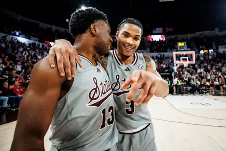 STARKVILLE, MS - February 21, 2024 - Mississippi State Guard Josh Hubbard (#13) and Mississippi State Guard Shakeel Moore (#3) during the game between the Ole Miss Rebels and the Mississippi State Bulldogs at Humphrey Coliseum in Starkville, MS. Photo By Mike Mattina