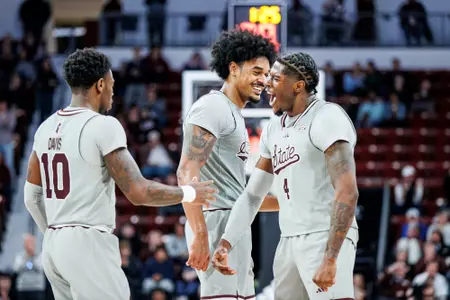 STARKVILLE, MS - February 07, 2024 - Mississippi State Forward Tolu Smith III (#1), Mississippi State Guard/Forward Cameron Matthews (#4) and Mississippi State Guard Dashawn "Rams" Davis (#10) during the game between the Georgia Bulldogs and the Mississippi State Bulldogs at Humphrey Coliseum in Starkville, MS. Photo By Mike Mattina