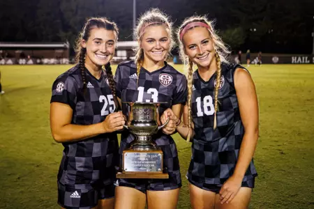 STARKVILLE, MS - October 08, 2023 - Mississippi State Defender Kelsey Clay (#25), Mississippi State Forward Morgan English (#13) and Mississippi State Forward Sutton Webb (#18) during the match between the Ole Miss Rebels and the Mississippi State Bulldogs at the MSU Soccer Field in Starkville, MS. Photo By Mike Mattina