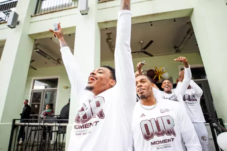 STARKVILLE, MS - March 17, 2024 -Mississippi State Forward DJ Jeffries (#0), Mississippi State Forward Jimmy Bell Jr. (#15) and Mississippi State Guard Shawn Jones Jr. (#5) during March Madness Selection Sunday Watch Party at Two Brothers Smoked Meats in Starkville, MS. Photo By Mike Mattina