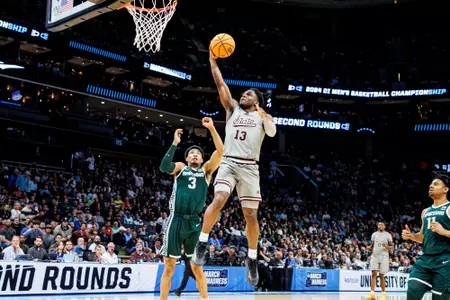 CHARLOTTE, NC - March 21, 2024 - Mississippi State Guard Josh Hubbard (#13) during the game between the Michigan State Spartans and the Mississippi State Bulldogs at the Spectrum Center in Charlotte, NC. Photo By Mike Mattina