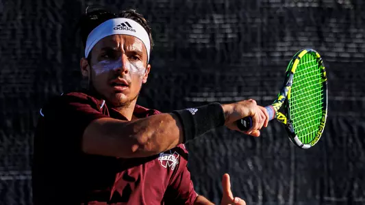 STARKVILLE, MS - March 29, 2024 - Mississippi State's Carles Hernandez during the match between the Ole Miss Rebels and the Mississippi State Bulldogs at the AJ Pitts Tennis Centre in Starkville, MS. Photo By Ivy Rose Ball