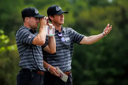 WEST POINT, MS - April 16, 2024 - Mississippi State's Harrison Davis and Mississippi State Head Coach Dusty Smith during the Mossy Oak Collegiate at Mossy Oak in West Point, MS. Photo By Jaden Powell