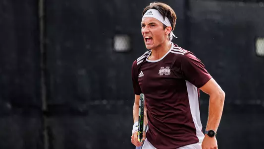 STARKVILLE, MS - March 31, 2024 - Mississippi State's Carles Hernandez during the match between the Alabama Crimson Tide and the Mississippi State Bulldogs at the AJ Pitts Tennis Centre in Starkville, MS. Photo By Jhordyn Stallworth