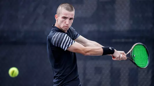 STARKVILLE, MS - March 03, 2024 - Mississippi State's Radomir Tomic during the match between the Georgia Bulldogs and the Mississippi State Bulldogs at the AJ Pitts Tennis Centre in Starkville, MS. Photo By Will Porada