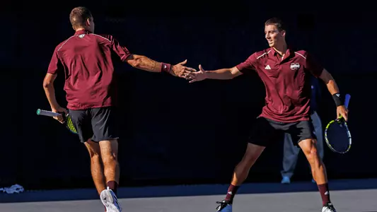 STARKVILLE, MS - March 29, 2024 - Mississippi State's Benito Sanchez Martinez and Mississippi State's Petar Jovanovic during the match between the Ole Miss Rebels and the Mississippi State Bulldogs at the AJ Pitts Tennis Centre in Starkville, MS. Photo By Ivy Rose Ball