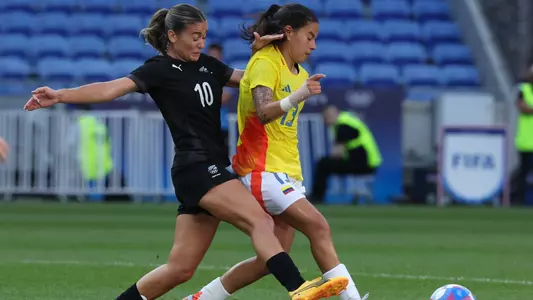 LYON, FRANCE - JULY 28: Ilana Izquierdo of Colombia and Indiah-Paige Riley of New Zealand in action during the Women's group A match between New Zealand and Colombia during the Olympic Games Paris 2024 at Stade de Lyon on July 28, 2024 in Lyon, France. (Photo by Claudio Villa/Getty Images)
