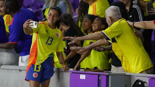 Apr 6, 2024; Orlando, FL, USA; Colombia midfielder Ilana Izquierdo (13) takes a photo with fans after the game against Mexico at Inter&Co Stadium. Mandatory Credit: Morgan Tencza-USA TODAY Sports