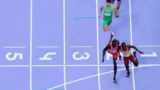 PARIS, FRANCE - AUGUST 10: (EDITORS NOTE: Image was captured using a robotic camera positioned above the field of play.)
Emmanuel Wanyonyi of Team Kenya crosses the finish line to win the Gold medal in front of silver medalist Marco Arop of Team Canada the Men's 800m Final on day fifteen of the Olympic Games Paris 2024 at Stade de France on August 10, 2024 in Paris, France. (Photo by Richard Heathcote/Getty Images)
