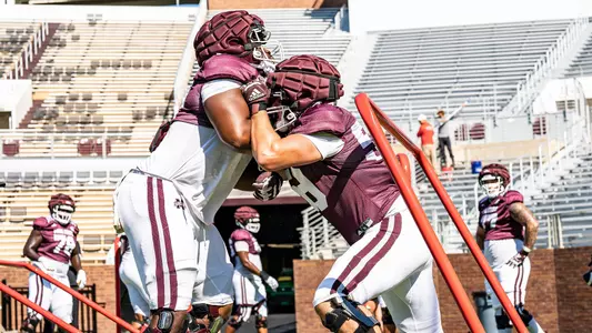 STARKVILLE, MS - August 11, 2024 - Mississippi State Offensive Lineman Jimothy Lewis Jr. (#74) and Mississippi State Offensive Lineman Alex Lopez (#59) during a training camp practice at Davis Wade Stadium at Scott Field in Starkville, MS. Photo By Bryce Mitchell