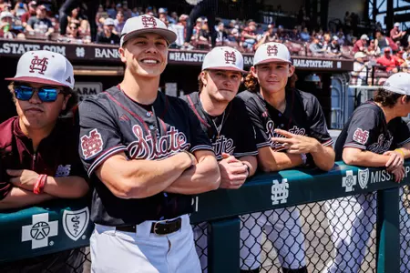 Max Miller STARKVILLE, MS - April 07, 2024 - Mississippi State Pitcher Max Miller (#19), Mississippi State Pitcher Will Passeau (#20) and Mississippi State Pitcher Pico Kohn (#9) during the game between the Georgia Bulldogs and the Mississippi State Bulldogs at Dudy Noble Field at Polk-Dement Stadium in Starkville, MS. Photo By Ivy Rose Ball
