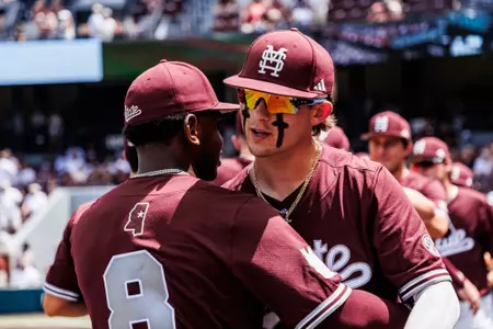 Michael O'Brien STARKVILLE, MS - May 18, 2024 - Mississippi State Infielder Amani Larry (#8) and Mississippi State Outfielder Michael O'Brien (#32) during the game between the Missouri Tigers and the Mississippi State Bulldogs at Dudy Noble Field at Polk-Dement Stadium in Starkville, MS. Photo By Connor Waltz