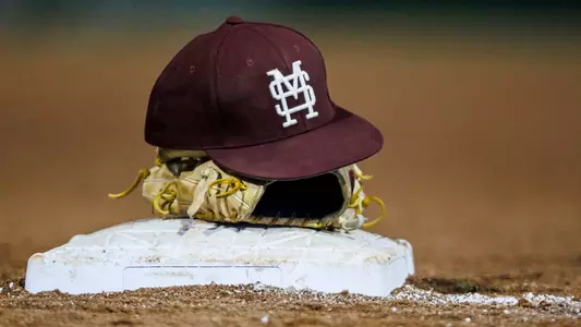 STARKVILLE, MS - May 05, 2023 - Mississippi State Infielder Slate Alford (#24) hat and glove during the game between the Arkansas Razorbacks and the Mississippi State Bulldogs at Dudy Noble Field at Polk-Dement Stadium in Starkville, MS. Photo By Jaden Powell