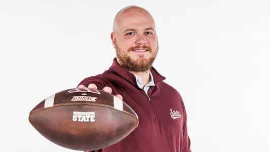 STARKVILLE, MS - December 18, 2023 -Mississippi State Quarterbacks Coach Matt Holecek during New Coach Photo Shoot at the Leo Seal Jr. Football Complex at Mississippi State University in Starkville, MS. Photo By Mike Mattina