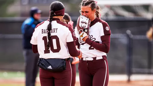 HUNTSVILLE, AL - February 22, 2025 - Mississippi State Infielder Nadia Barbary (#10) and Mississippi State Pitcher Sara Phillips (#20) during the game between the Louisiana Tech Bulldogs and the Mississippi State Bulldogs during the Rocket City Softball Showcase at the UAH softball field in Huntsville, AL. Photo By Ivy Rose Ball