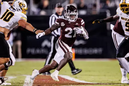 STARKVILLE, MS - November 23, 2024 - Mississippi State Running Back Davon Booth (#21) during the game between the Missouri Tigers and the Mississippi State Bulldogs at Davis Wade Stadium at Scott Field in Starkville, MS. Photo By Will Porada