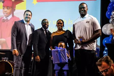 STARKVILLE, MS - May 08, 2025 - Mississippi State Offensive Lineman Jacoby Jackson (#75) and Mississippi State Head Coach Jeff Lebby during The Night of Wishes at The Mill Conference Center in Starkville, MS. Photo By Mike Mattina