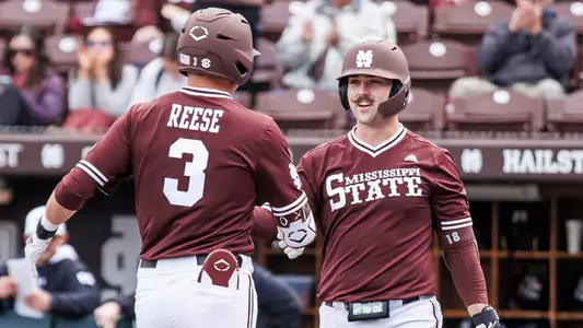 STARKVILLE, MS - February 14, 2025 - Mississippi State Infielder Ace Reese (#3) and Mississippi State Designated Hitter/Pitcher Noah Sullivan (#18) during the game between the Manhattan Jaspers and the Mississippi State Bulldogs at Dudy Noble Field at Polk-Dement Stadium in Starkville, MS. Photo By Mike Mattina