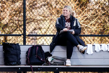 STARKVILLE, MS - February 13, 2025 - Mississippi State Pitcher Josey Marron (#55) and Mississippi State Assistnat Softball Coach Taryne Mowatt-McKinney during the game between the Southern Illinois Salukis and the Mississippi State Bulldogs at Nusz Park in Starkville, MS. Photo By Ivy Rose Ball