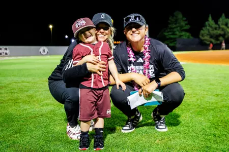 STARKVILLE, MS - May 01, 2025 - Mississippi State Assistant Softball Coach Taryne Mowatt-McKinney and Mississippi State Graduate Assistant Alyssa Loza during the game between the Ole Miss Rebels and the Mississippi State Bulldogs at Nusz Park in Starkville, MS. Photo By Ivy Rose Ball