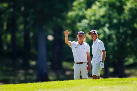 WEST POINT, MS - April 14, 2025 - Mississippi State Assistant Coach Kyle Cornelius and Mississippi State's Ugo Malcor during the Old Waverly Collegiate Championship at Old Waverly Golf Club in West Point, MS. Photo By Mike Mattina