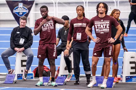 VIRGINIA BEACH, VA - March 13, 2025 - Mississippi State Sprinter Nicholas Fakorede, Mississippi State Assistant Coach Cha'Mia Rothwell and Mississippi State Sprinter Cyrus Jacobs Jr. during the NCAA Indoor Championships at the Virginia Beach Sports Complex in Virginia Beach, VA. Photo by Jhordyn Stallworth