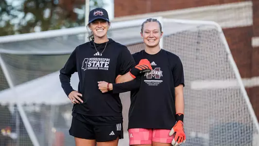 STARKVILLE, MS - November 16, 2024 - Mississippi State Volunteer Assistant Coach Kat Stratton and Mississippi State Goal Keeper Maddy Anderson (#1) during the match between the Southern University Jaguars and the Mississippi State Bulldogs at the MSU Soccer Field in Starkville, MS. Photo By Ivy Rose Ball